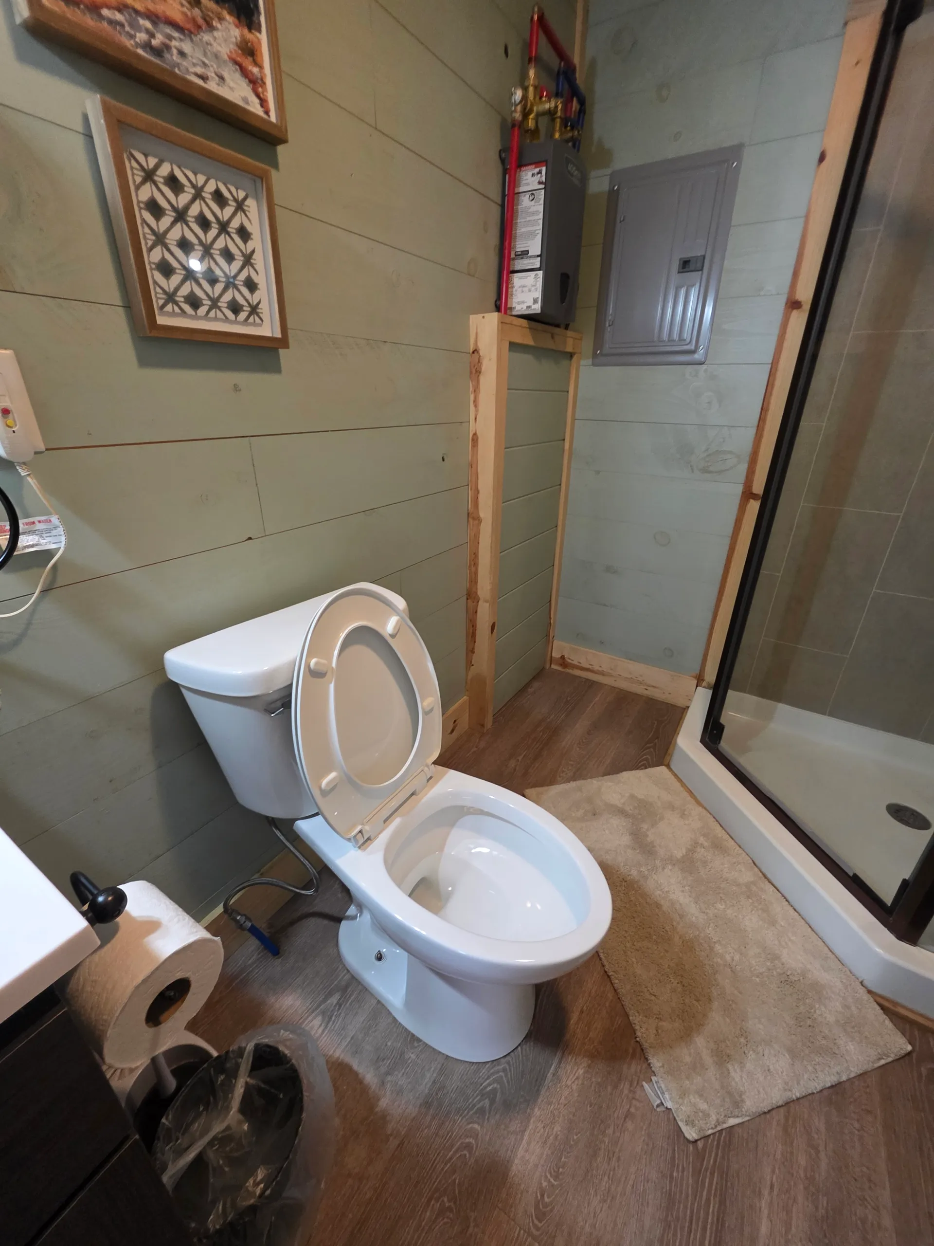 Bathroom vanity with granite countertop, oil-rubbed bronze fixtures, and mirror at Butterfly Ridge cabin
