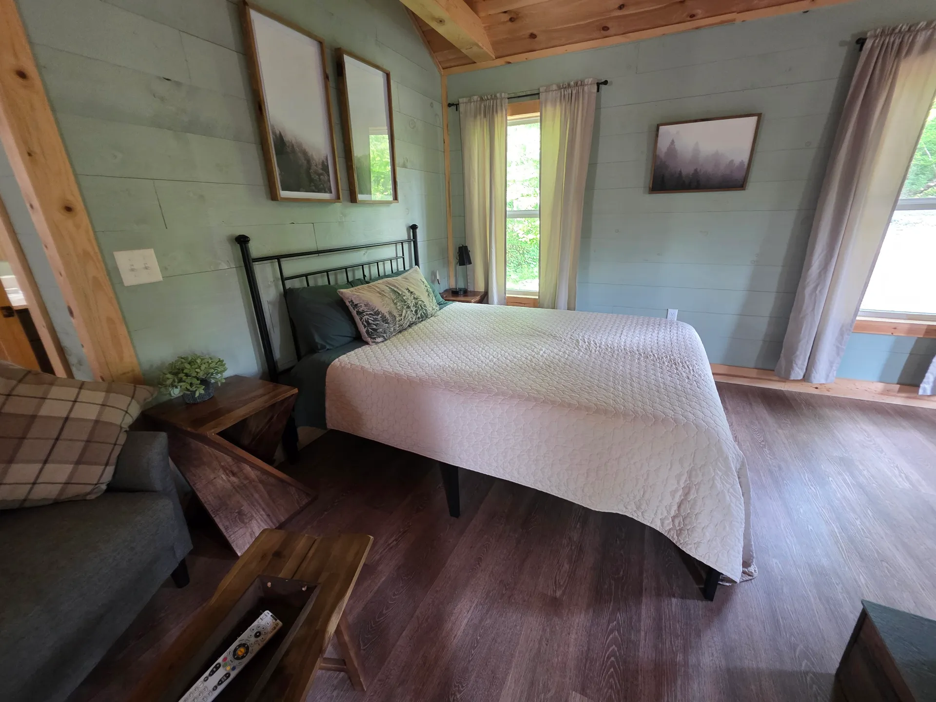 Black refrigerator, microwave, and countertop with kitchenette supplies at Butterfly Ridge cabin