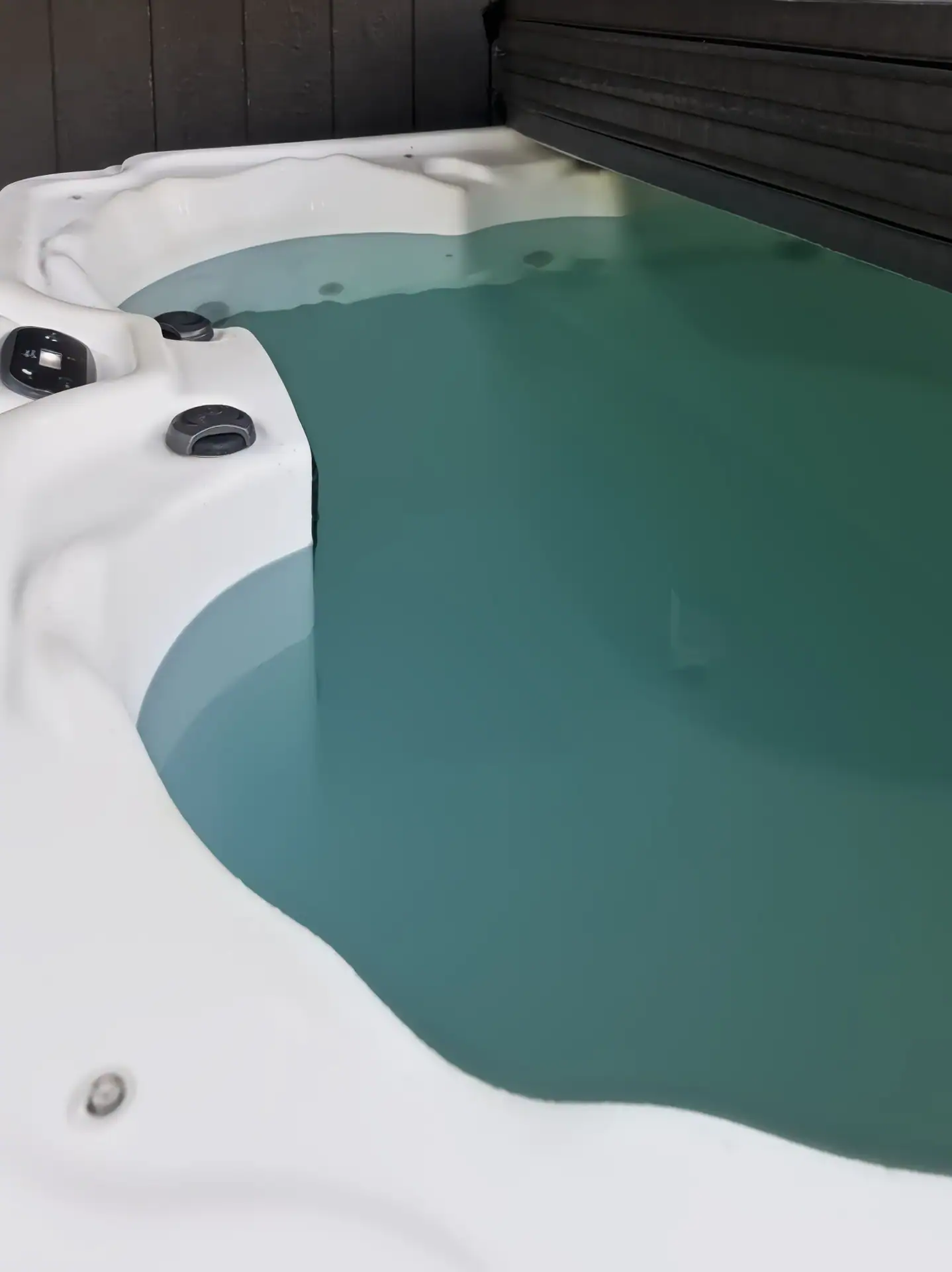 Filled hot tub with jets at The Getaway House.