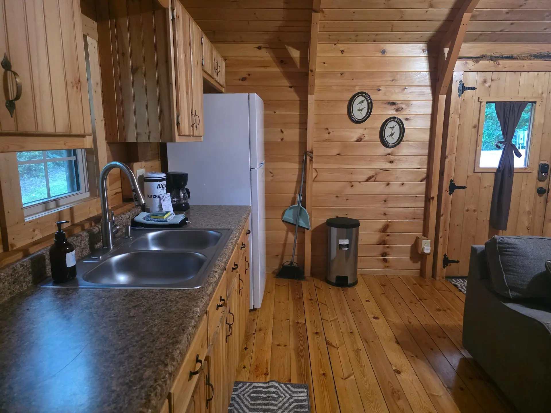 Kitchen counter with double sink and coffee maker in Whippoorwill