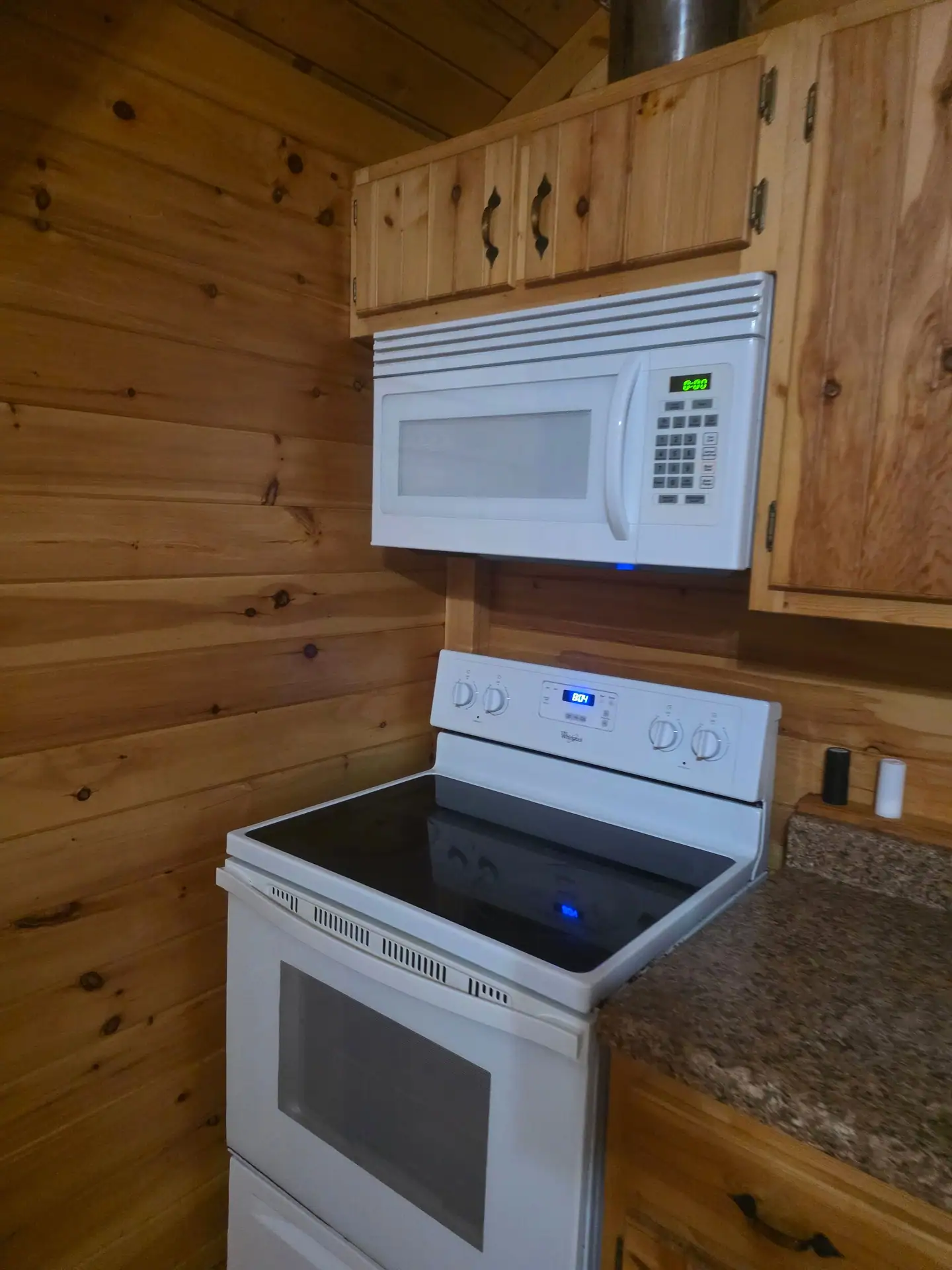 Electric stove and microwave in the Whippoorwill kitchen